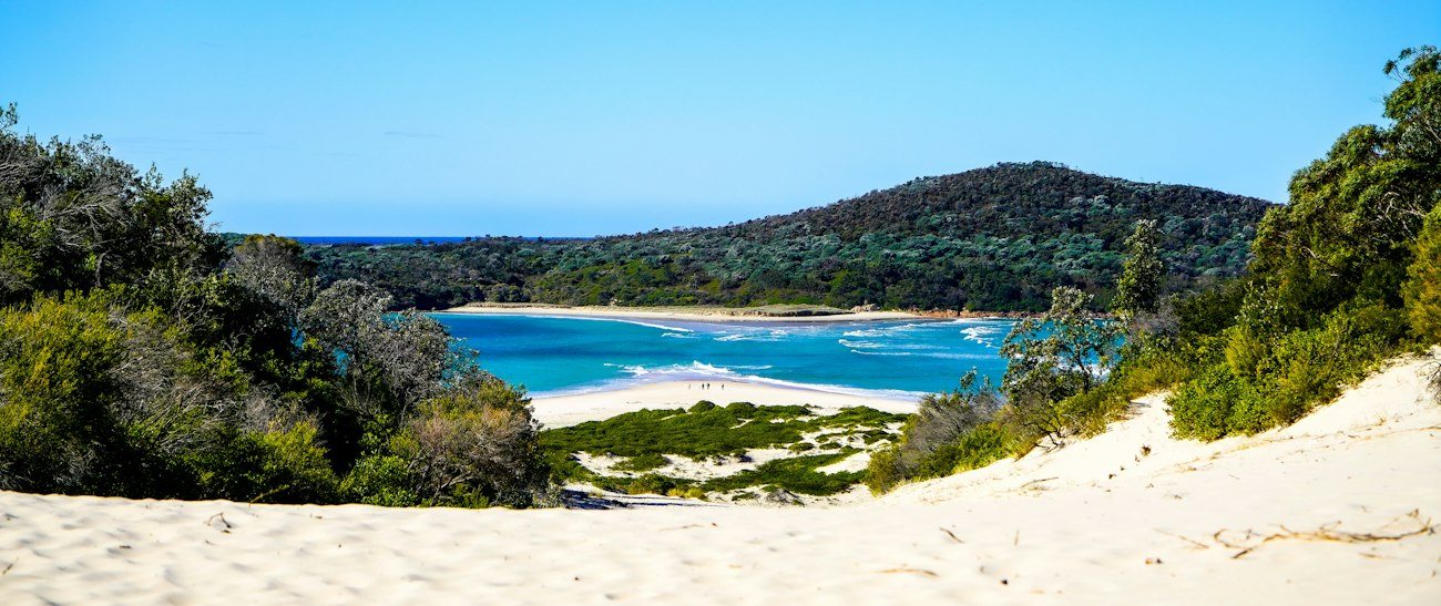 A sandy path opening onto Fingal Bay near Port Stephens